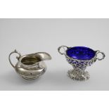 AN EARLY VICTORIAN OPENWORK SUGAR BOWL with twin handles and a chased domed base, crested (blue
