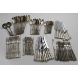 A WILLIAM IV / VICTORIAN CANTEEN OF KINGS' PATTERN FLATWARE TO INCLUDE:- Twelve table forks,