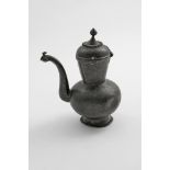 A RARE INDIAN MUGHAL NIELLOWORK EWER decorated all over with engraved arabeque friezes of