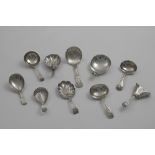NINE VARIOUS ANTIQUE CADDY SPOONS including a Scottish Queen's pattern example and the bowl of a