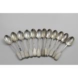 A SET OF TWELVE LATE VICTORIAN FIDDLE PATTERN DESSERT SPOONS initialled "SJS", by George Maudsley