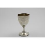 A GEORGE III WINE GOBLET on a reeded pedestal foot, inscribed "A just tribute of respect