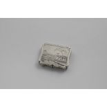 AN EARLY VICTORIAN ENGRAVED VINAIGRETTE rectangular with a serpentine outline, the cover with a