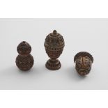 A LATE 18TH / EARLY 19TH CENTURY CARVED COQUILLA NUT NUTMEG GRATER in the form of an acorn, a carved