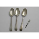 A SET OF THREE GEORGE III OLD ENGLISH PATTERN TABLE SPOONS crested, maker's mark "IL" (script),