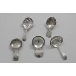 A GEORGE III CADDY SPOON with a pierced, spade-shaped bowl and engraving, by Joseph Taylor,