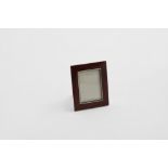 A LATE 19TH CENTURY AUSTRO-HUNGARIAN SMALL PHOTOGRAPH FRAME with a crimson-enamelled border, an