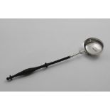 A GEORGE III / IV SCOTTISH PROVINCIAL PUNCH LADLE with a turned hardwood handle and an oval bowl