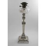 A LATE VICTORIAN ELECTROPLATED LAMP in the form of a large Neo-classical candlestick with a fluted