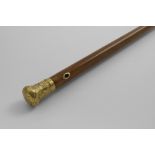 A GEORGE III 22 CT. GOLD MOUNTED MALACCA WALKING CANE The knop chased with hunting scenes in low