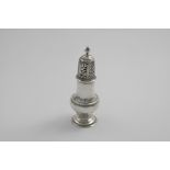 A LATE GEORGE II SUGAR CASTER by Samuel Wood, London 1757; 6.75" (17 cms) high; 5.35 oz