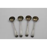 A SET OF FOUR VICTORIAN SALT SPOONS Bead pattern single-struck, engraved with a crest above the