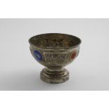 AN EDWARDIAN ROSE BOWL with repousse-work panels of Art Nouveau flowers alternating with coloured