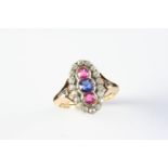 AN EARLY 20TH CENTURY RUBY, SAPPHIRE AND DIAMOND CLUSTER RING centred with a circular-cut sapphire