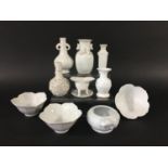 COLLECTION OF BLANC DE CHINE various dates, including flower shaped bowls, a vase with chilong to