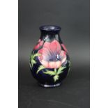 MODERN MOORCROFT VASE a modern Moorcroft vase, in the Anemone design and on a blue ground. With it's
