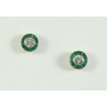 A PAIR OF EMERALD AND DIAMOND CLUSTER STUD EARRINGS each earring set with a circular-cut diamond