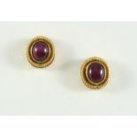 A PAIR OF GOLD AND RUBY STUD EARRINGS BY LALAOUNIS each set with an oval ruby cabochon within an