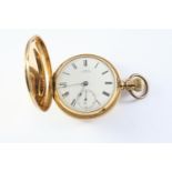A 14CT GOLD FULL HUNTING CASED POCKET WATCH BY WALTHAM the white enamel dial signed A.W. Co.