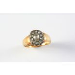 AN ANTIQUE DIAMOND CLUSTER RING the central rose-cut diamond is set within a surround of smaller