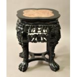 CHINESE HARDWOOD AND MARBLE MOUNTED URN STAND of quatrelobe form, fruiting foliage and wave