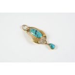 AN ARTS & CRAFTS TURQUOISE AND GOLD PENDANT BY MURRLE BENNETT & CO the 15ct gold openwork mount is