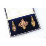 A GEORGIAN GEM SET BROOCH AND A PAIR OF DROP EARRINGS all set with crystal stones, with pink