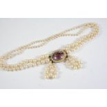 A CULTURED PEARL AND AMETHYST CHOKER the pearls graduate from approximately 3.5 to 8.0mm to an