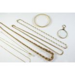 A 9CT GOLD ROPE LINK NECKLACE 53cm long, 14.7 grams, a 9ct gold bangle, 18.7 grams, a 9ct gold
