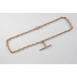 A 9CT ROSE GOLD WATCH CHAIN the fancy link chain suspends a 9ct gold 't' bar, 40cm long, 18 grams