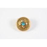 AN ART NOUVEAU 9CT GOLD HINGED LOCKET BROOCH of circular form, centred with a turquoise cabochon