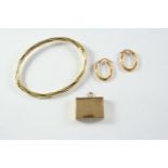 A 14CT GOLD HALF HINGED BANGLE 5.7 grams, together with a pair of 9ct gold hoop earrings, 1.2