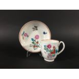 WORCESTER COFFEE CUP AND SAUCER circa 1765-70, with painted and enamelled floral sprays inside in