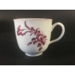 CHAMPION BRISTOL COFFEE CUP circa 1770, puce printed and painted with flowers, blue crossed sword