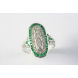 AN EMERALD AND DIAMOND CLUSTER RING the five central circular-cut diamonds are set within a surround