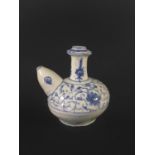 BLUE AND WHITE PORCELAIN KENDI perhaps Korean and 19th century, painted with flowers and foliage,