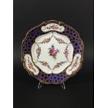 SEVRES STYLE PLATE the later 18th century body with outside or later decoration of floral garlands