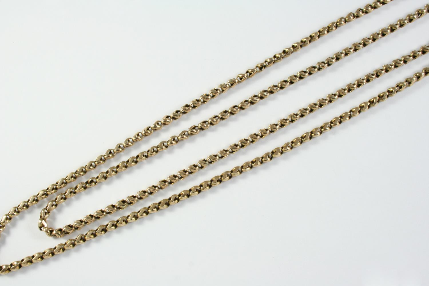 A GOLD TWO ROW FANCY LINK CHAIN NECKLACE 54cm long, 27 grams