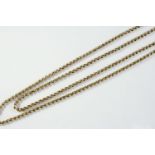 A GOLD TWO ROW FANCY LINK CHAIN NECKLACE 54cm long, 27 grams