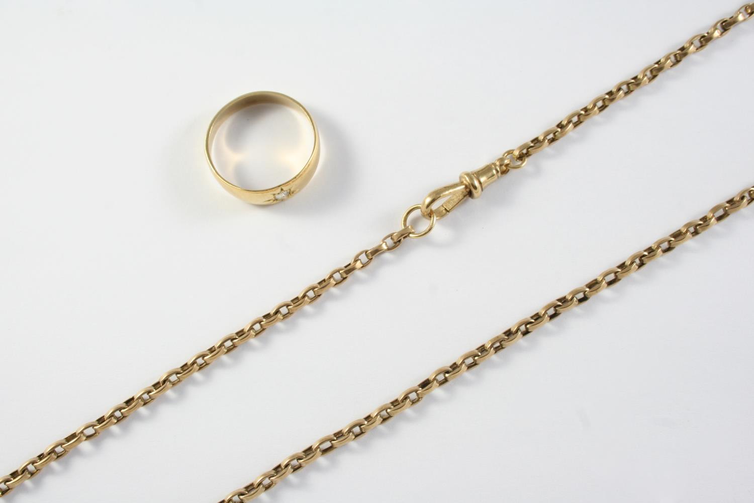 A GOLD WATCH CHAIN formed with oval-shaped links, 56.5cm long, 12 grams, together with a gold