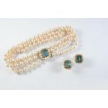 A CULTURED PEARL AND BLUE TOPAZ THREE ROW CHOKER the uniform pearls measure approximately 8.8mm