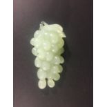 CHINESE CELADON JADE BUNCH OF GRAPES 20th century but in the 18th century style, length 13.5cm