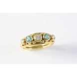 A DIAMOND AND ZIRCON FIVE STONE RING the three graduated circular-cut diamonds and two circular-