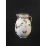 COOKWORTH BRISTOL PORCELAIN SPARROWBEAK JUG circa 1770, painted with floral swags and scattered