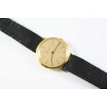 A GENTLEMAN'S GOLD WRISTWATCH BY KUTCHINSKY the signed circular gold coloured dial with Roman
