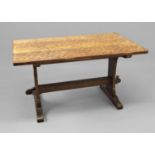 BOB HUNTER - 'WREN MAN' OAK REFECTORY TABLE an oak table with an adzed top, with shaped supports and