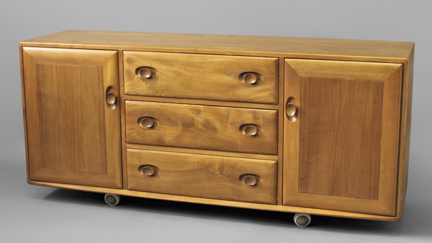 ERCOL SIDEBOARD a large light elm sideboard with 3 central drawers (1 for cutlery) and flanked by