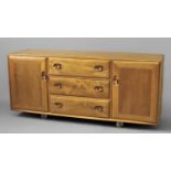 ERCOL SIDEBOARD a large light elm sideboard with 3 central drawers (1 for cutlery) and flanked by