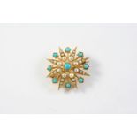 A TURQUOISE AND PEARL SET STAR BROOCH mounted with circular turquoise cabochons and graduated half