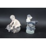 ROYAL COPENHAGEN including Model No 648 Faun wrestling Bear, and 2113 Faun with Crow. Both